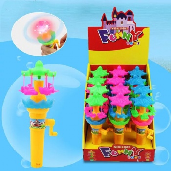 handoperated merry-go-round with light toy candy